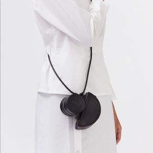 Building Block “Etc Sling” Leather Pouch Bag